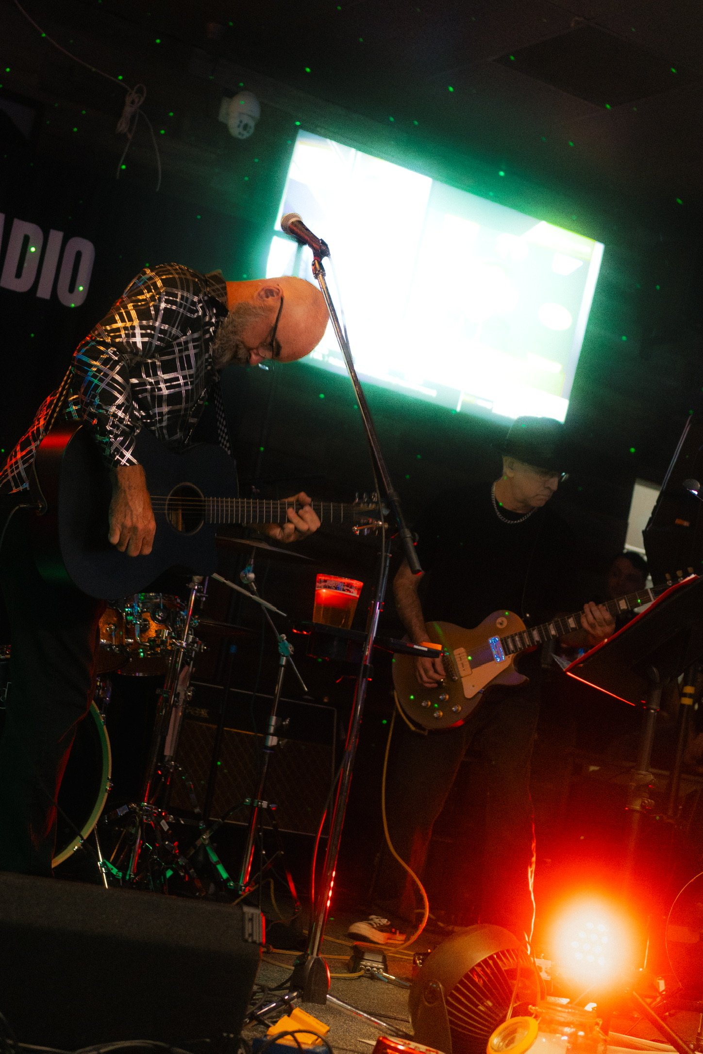 Members of Radio NotRadio playing on stage